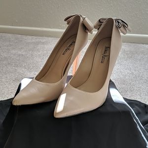 Neiman Marcus leather nude heels with bow detail